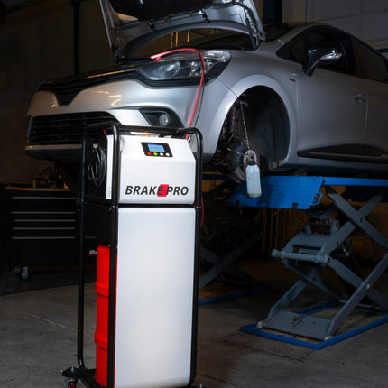 Example of brake bleeder on stand in garage in use
